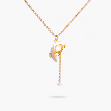 Gold necklace with a pendant on a white background