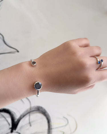 model shot of Amare Wear Labradorite Silver Handcuff Bracelet