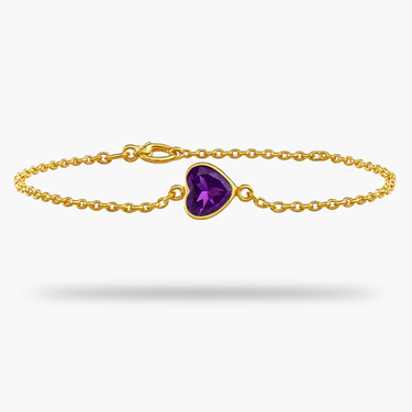 Gold bracelet with a purple gemstone on a white background