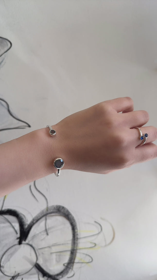 video model shot of Amare Wear Labradorite Silver Handcuff Bracelet